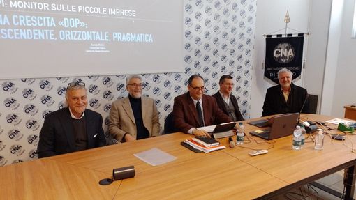 foto di archivio e conferenza cna