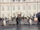 turisti davanti a Palazzo Reale