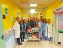 Donati regali e giocattoli per i bimbi dell'ospedale di Rivoli